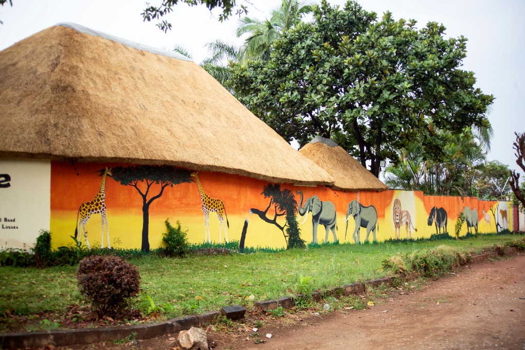 Thatched Chalet with African Wildlife Safari Mural